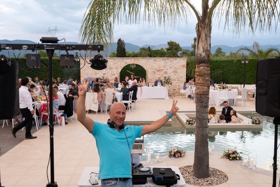 DJ Alex Bedeleu at a luxury outdoor wedding venue in Zante